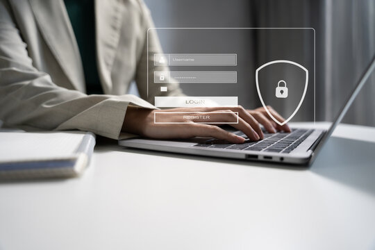 Businessman typing login and password in the concept of cyber security, information security, data protection, and encryption for secure access to user's personal information.