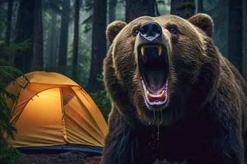 Foto op Plexiglas a camping scene in the forest where a bear is aggressively approaching a tent, instilling a sense of fear and danger. © EdNurg