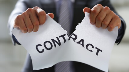 White collar worker in suit and tie tear contract closeup. Get jobless arm form rip job loss...