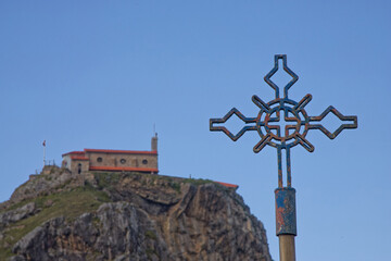 BERMEO, SPAIN, September 26, 2023 : Cross of one of stations of the Cross to San Juan de Gaztelugatxe.