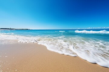 Fototapeta na wymiar Sunny day beach with clear water, small waves, blue sky and summery backdrop. Generative AI