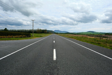 Straight road in the countryside of New Zealand