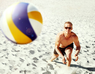 Beach, volleyball and top view of fitness man at sea with ball, energy or travel freedom. Ocean,...