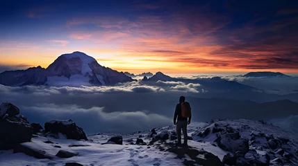  Kilimanjaro summit, Africa, lone trekker in foreground for scale, glaciers and volcanic craters visible, stark beauty, pre - dawn light © Marco Attano