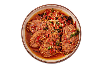 Top view of Stir-fried spicy beef with fingerroot and black pepper on black-white plate isolated on white background.