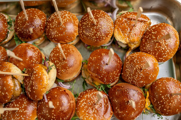 Tray of grilled burgers bbq party dinner sharing dinner 