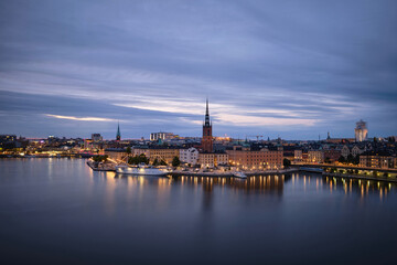 Obraz premium Scenic panoramic aerial view of Riddarholmen, Gamla Stan, in the Old Town in Stockholm after sunset