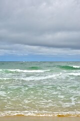 an emerald sea of waves