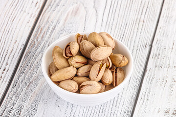 Salted tasty pistachio nuts heap