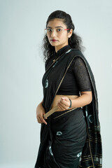 Indian lady teacher is showing stick. Individually on a white background.