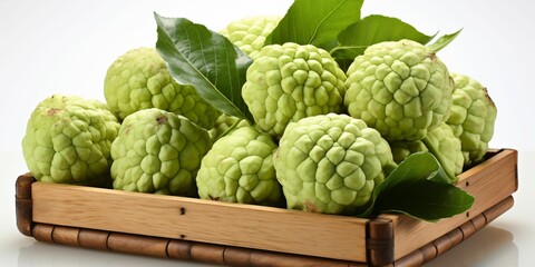 Fototapeta premium Fresh Custard Apples in a Basket. Sugar Apple. Healthy Fruit
