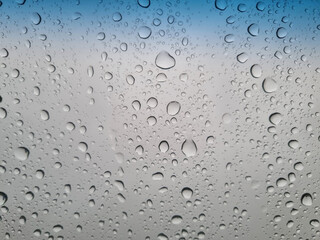 Raindrops on the car glass. Selective focus