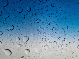 Raindrops on the car glass. Selective focus