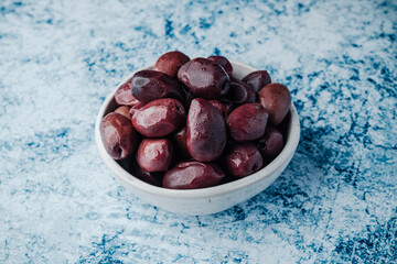 ceramic bowl with some kalamata olives