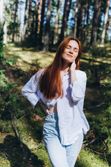 Beautiful woman natural face freckles casual female portrait lifestyle beauty girl. Outdoor girl portrait in green summer forest