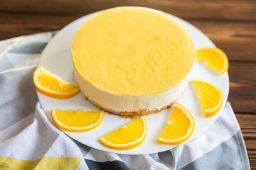 Sugar dessert, cake with cream and citrus. Holiday baking. Homemade pastry