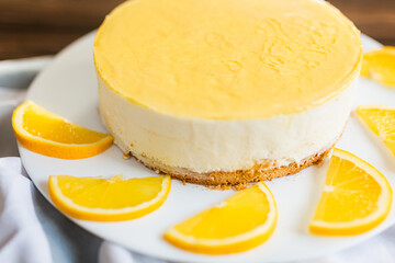 Sugar dessert, cake with cream and citrus. Holiday baking. Homemade pastry