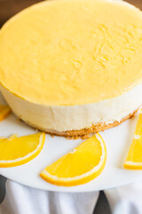 Sugar dessert, cake with cream and citrus. Holiday baking. Homemade pastry
