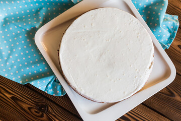 Sugar dessert, cake with cream and chocolate. Holiday baking. Homemade pastry