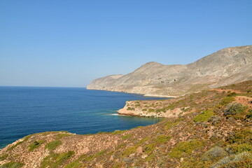 Fototapeta na wymiar rough and rocky shore line of kalymnos Island Greece