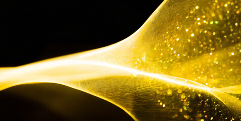 yellow tail wave abstract for luxury design with particle and sparkle light transparent back 