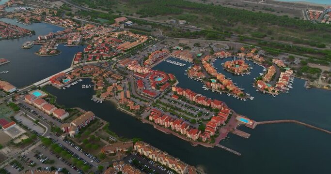 Aerial view over port Leucate mediterranean sea sandy shore sunset marina harbor
