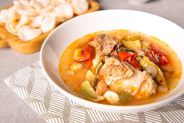 Asem-asem daging iga sapi or beef rib soup with sweet and sour taste. Homemade soup food originates from Central Java but is also famous in East Java, Indonesia