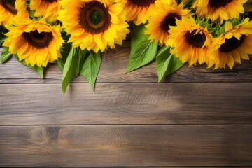 overhead shot of sunflowers on a rustic wooden table