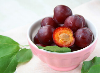 natural organic plums on the table