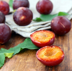 Fototapeta na wymiar natural organic plums on the table