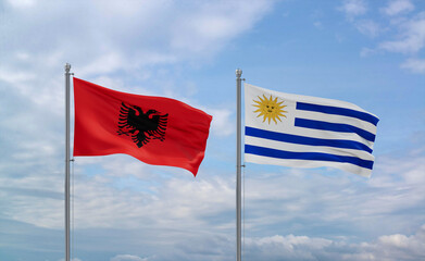 Uruguay and Albania flags, country relationship concept