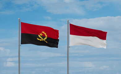 Indonesia and Angola flags, country relationship concept