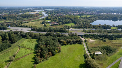 Mechelen, Antwerp Province, Belgium, 06 09 2023, Aerial view of the E19 highway between Brussels and Antwerp with traffic, high angle view. High quality photo