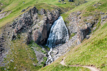 Beautiful waterfall in summer in the Caucasus mountains