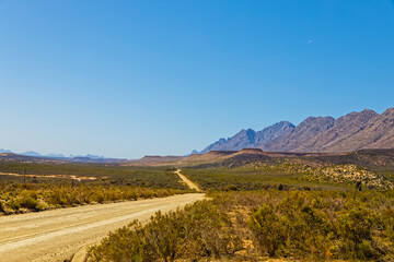 Fototapeta na wymiar Winding gravel road in the Little Karoo