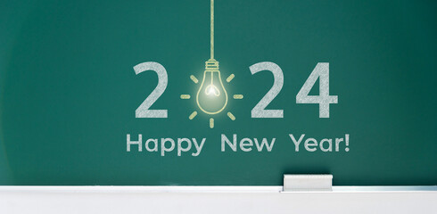 2024 light bulb on the blackboard