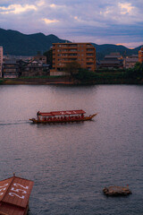 Naklejka premium A boat on the Kisogawa River
