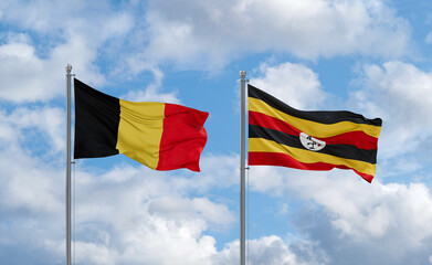 Uganda and Belgium flags, country relationship concept