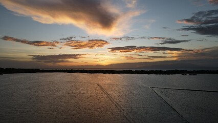 sunset over the sea, salinas, bani 