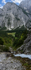 Fototapeta na wymiar Spring of River Nadiza and famous hiking destination Slemenova peak in Julian Alps in Slovenia