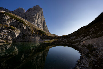 Lower Alpine Lake of Kriški Podi, the highest situated lakes in Slovenia. It is a glacial lake in...