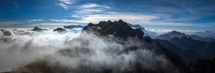 Wide panorama of European Alps in Sunset Clouds  Silhouette background