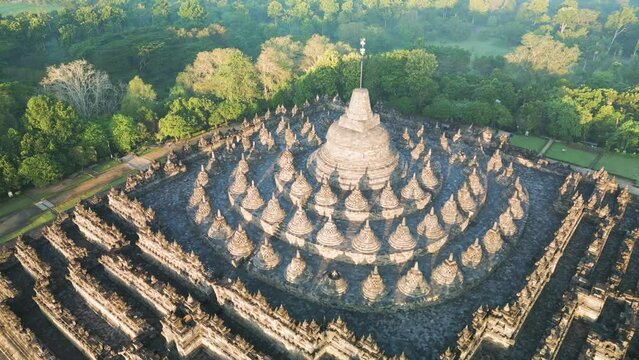 Borobudur temple on the background of sunrise and fog. Aerial view. Java, Indonesia
