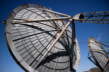 Old data transmission dishes in an abandoned base