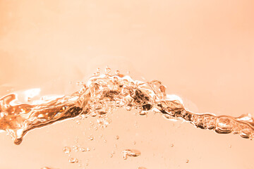 Orange water waves and bubbles.