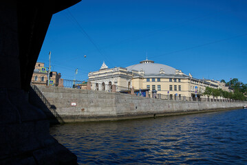 building near the river in summer
