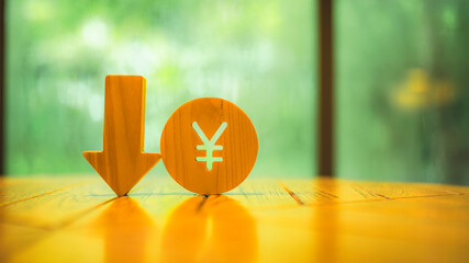 Yen symbol model and down arrow  concepts of systems of raising or lowering Fed interest rates,...