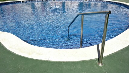 steel railing for access to the pool