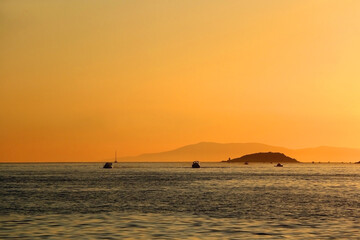 Sailing boat and beautiful sunset in Vela Luka, on island Korcula, Croatia.