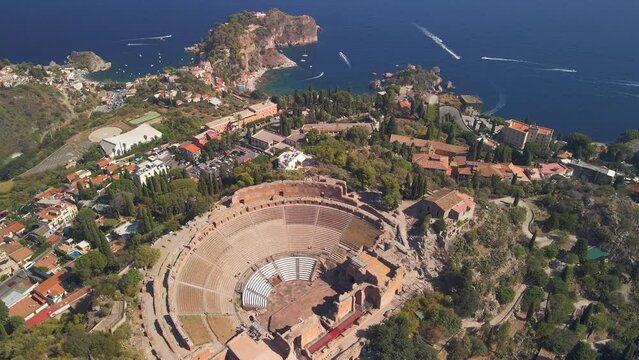 Aerial view of the stunning Taormina ancient town with its Greek amphitheater. Sicily